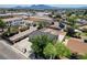 Aerial view of the house with a spacious backyard, and nearby building, showcasing the property's location at 125 S 15Th St, Las Vegas, NV 89101