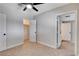 Bedroom featuring tile flooring, ceiling fan, closet space and bright natural light at 125 S 15Th St, Las Vegas, NV 89101