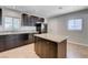 Bright kitchen featuring an island, granite countertops, and modern appliances, creating a functional and stylish space at 125 S 15Th St, Las Vegas, NV 89101
