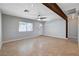 Open living space with tile flooring, recessed lighting, and a beamed ceiling that adds architectural interest at 125 S 15Th St, Las Vegas, NV 89101