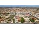 Neighborhood aerial view showing a desert landscape and various homes at 1345 Morning Sun Way, Las Vegas, NV 89110