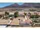 Desert property featuring incredible mountain views and sprawling nearby landscape at 1345 Morning Sun Way, Las Vegas, NV 89110