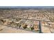Aerial view showcasing many homes in a desert landscape, and nearby mountains at 1345 Morning Sun Way, Las Vegas, NV 89110