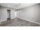 This bedroom offers hardwood flooring, recessed lighting, and two entryways for easy access at 1345 Morning Sun Way, Las Vegas, NV 89110