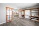 Bedroom with wood floors, custom shelving, and french doors at 1345 Morning Sun Way, Las Vegas, NV 89110