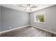 Bedroom with hard wood floors and natural lighting at 1345 Morning Sun Way, Las Vegas, NV 89110