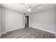 Bedroom with hard wood floors and an ensuite bathroom at 1345 Morning Sun Way, Las Vegas, NV 89110