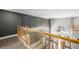Second story hallway with wood trim and a grand entrance at 1345 Morning Sun Way, Las Vegas, NV 89110