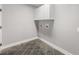 Practical laundry room with tile floors and upper cabinets for ample storage space at 1345 Morning Sun Way, Las Vegas, NV 89110