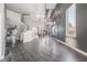 Open concept living room featuring high ceilings, tile floors, and natural light at 1345 Morning Sun Way, Las Vegas, NV 89110