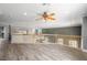 Spacious loft featuring wood floors and a wooden railing, ideal for versatile use at 1345 Morning Sun Way, Las Vegas, NV 89110