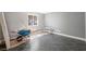 Cozy room with tile flooring and a large window offers a bright space at 1345 Morning Sun Way, Las Vegas, NV 89110