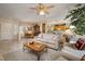 Bright, spacious living room connects to dining area, bar, and kitchen at 1620 Fieldbrook St, Henderson, NV 89052