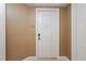 Hallway leading to a door with modern design features and security system at 2000 N Fashion Show Dr # 2704, Las Vegas, NV 89109