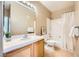 Modest bathroom with a single sink vanity, and a tub/shower combination with white tile at 2108 Calville St # 104, Las Vegas, NV 89128