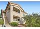 Exterior view showcasing the architectural design and landscaping of the building at 2108 Calville St # 104, Las Vegas, NV 89128