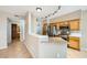 Cozy kitchen with stainless steel appliances, granite countertops, wooden cabinets, and a breakfast bar at 2108 Calville St # 104, Las Vegas, NV 89128
