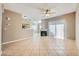 Bright living space with tile floors, fireplace, and a view into the kitchen at 2108 Calville St # 104, Las Vegas, NV 89128