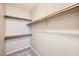 Walk-in closet with shelving and hanging rods for optimal storage at 2108 Calville St # 104, Las Vegas, NV 89128