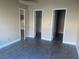 Spacious bedroom with wood-look floors and access to multiple closets for ample storage at 228 Caracas Dr, Las Vegas, NV 89145