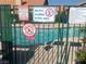 Community pool featuring pool rules and regulations at 228 Caracas Dr, Las Vegas, NV 89145