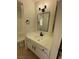 Bright bathroom featuring a white vanity with a dark faucet and modern lighting at 2318 El Molino Cir, Las Vegas, NV 89108
