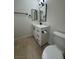 Bathroom featuring a bright vanity and a modern mirror with a dark hardware at 2318 El Molino Cir, Las Vegas, NV 89108