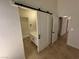Bathroom with modern vanity, toilet, and adjacent doorway at 2318 El Molino Cir, Las Vegas, NV 89108