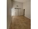 Bedroom with sliding doors and an opening into the hallway at 2318 El Molino Cir, Las Vegas, NV 89108