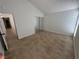 Bedroom featuring closet with mirrored sliding doors and view to hall at 2318 El Molino Cir, Las Vegas, NV 89108