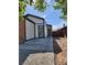 Charming single-story home showcasing modern architectural style with a brick accent and a well-maintained yard at 2318 El Molino Cir, Las Vegas, NV 89108