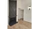 Bright living room with tile flooring and dark fireplace with modern lighting at 2318 El Molino Cir, Las Vegas, NV 89108