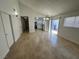 Inviting living area featuring tile floors, an open layout, and sliding glass doors, blending indoor-outdoor living at 2318 El Molino Cir, Las Vegas, NV 89108