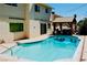 Beautiful backyard featuring a refreshing pool and a charming gazebo with seating at 2659 Vegas Valley Dr, Las Vegas, NV 89121