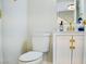 Clean bathroom featuring a toilet and vanity with brass hardware and modern fixtures at 2659 Vegas Valley Dr, Las Vegas, NV 89121
