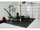 Garage features home gym and black mat flooring at 2659 Vegas Valley Dr, Las Vegas, NV 89121