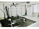 Home gym within a garage area with exercise equipment providing space for fitness and wellness activities at 2659 Vegas Valley Dr, Las Vegas, NV 89121