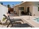 Backyard pool area with lounge chairs, patio, and covered seating, perfect for relaxing and entertaining at 2659 Vegas Valley Dr, Las Vegas, NV 89121