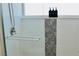 Contemporary shower featuring white tile, decorative accent, and sleek glass enclosure at 2659 Vegas Valley Dr, Las Vegas, NV 89121