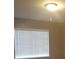 Bedroom featuring a large window with blinds at 3116 Gentle Breeze St, Las Vegas, NV 89108