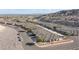 Aerial view of a desert community with many homes and desert landscaping at 3161 Quail Song Dr # 3161, Laughlin, NV 89029