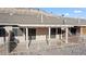 Relaxing backyard featuring a covered patio, neutral color scheme, and minimal landscaping at 3161 Quail Song Dr # 3161, Laughlin, NV 89029