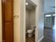 Half bath featuring a toilet and towel storage at 3161 Quail Song Dr # 3161, Laughlin, NV 89029
