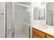 Bathroom featuring a glass shower door and a wooden vanity with sink at 3161 Quail Song Dr # 3161, Laughlin, NV 89029