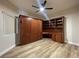Bedroom with built-in shelving and Murphy bed at 3161 Quail Song Dr # 3161, Laughlin, NV 89029