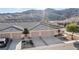 Charming townhome featuring a neutral color scheme, attached garage and low-maintenance landscaping at 3161 Quail Song Dr # 3161, Laughlin, NV 89029