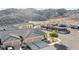 Desert community with tile roofs, RV parking, desert landscaping and mountain views at 3161 Quail Song Dr # 3161, Laughlin, NV 89029