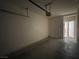 Attached garage is ready to be used as parking or storage at 3161 Quail Song Dr # 3161, Laughlin, NV 89029