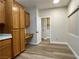 Home office featuring built-in desk and wood-look floors at 3161 Quail Song Dr # 3161, Laughlin, NV 89029