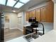 Modern kitchen with stainless steel appliances, wood cabinets, and ample counter space at 3161 Quail Song Dr # 3161, Laughlin, NV 89029